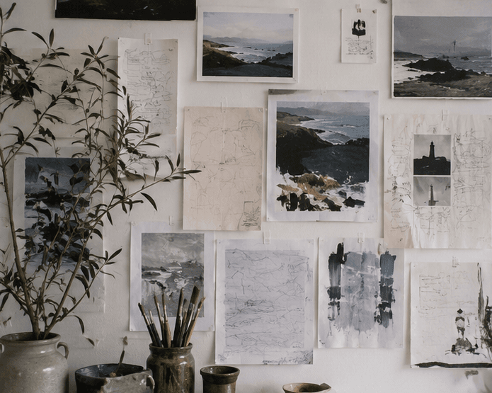 Studies and sketches pinned to the studio wall.